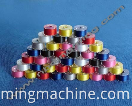Sideless rewound bobbin thread for sewing machine